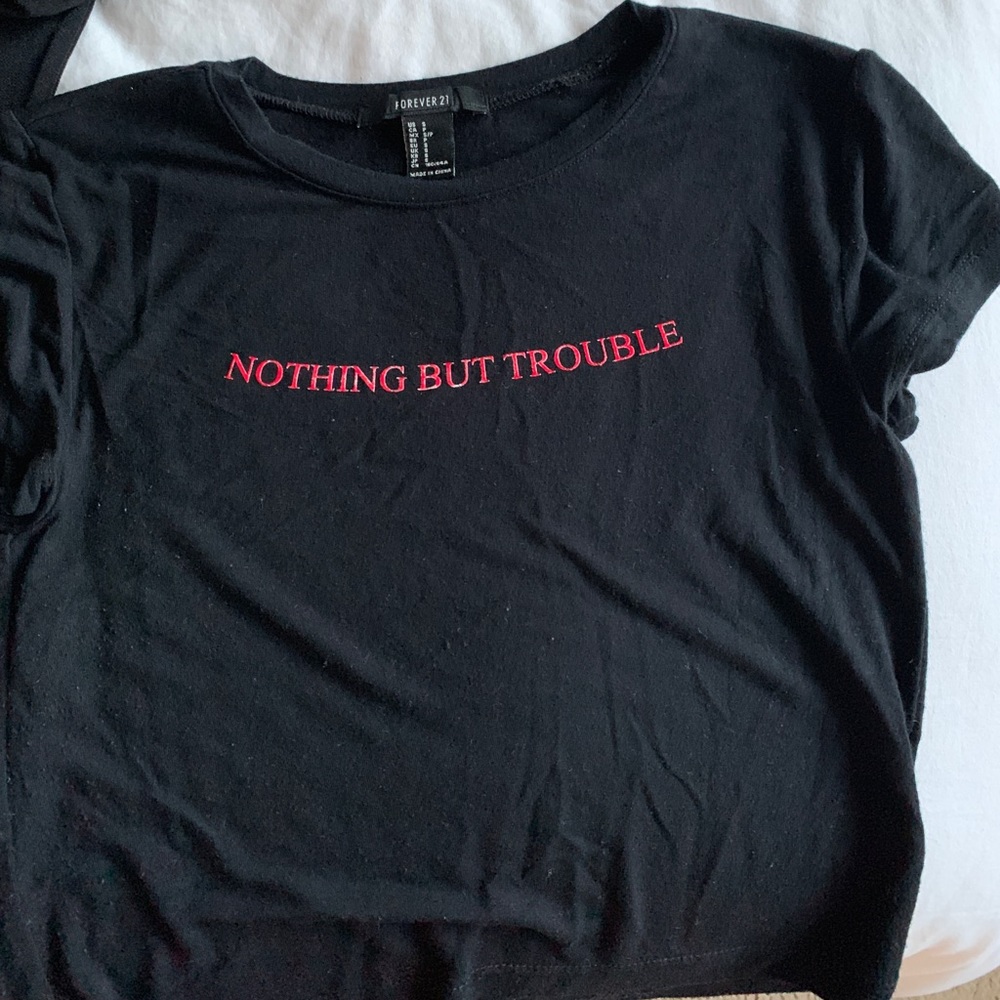 Black crop top with graphic on the front
